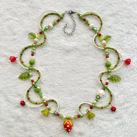 Necklace with a strawberry