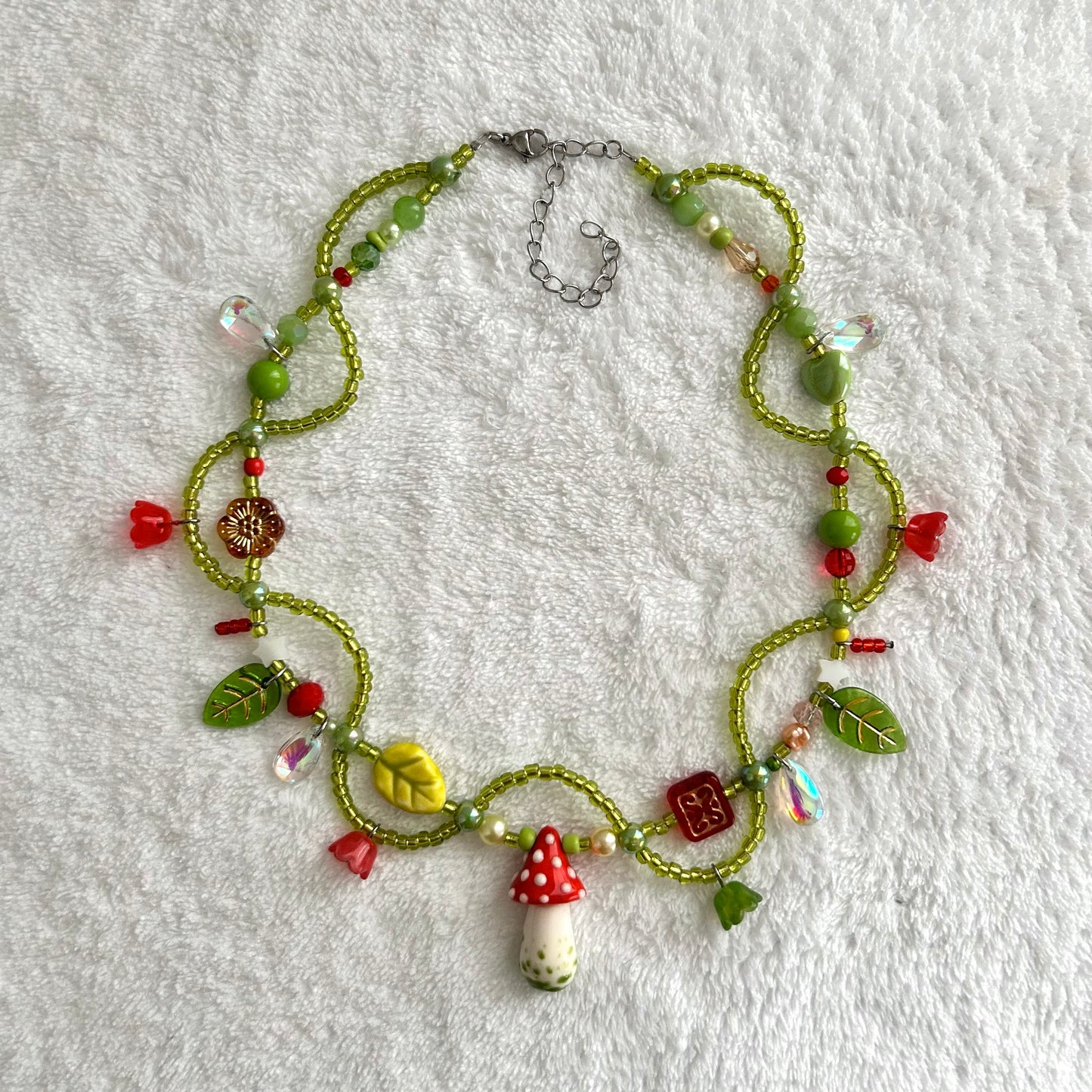 Necklace with a mushroom and vines